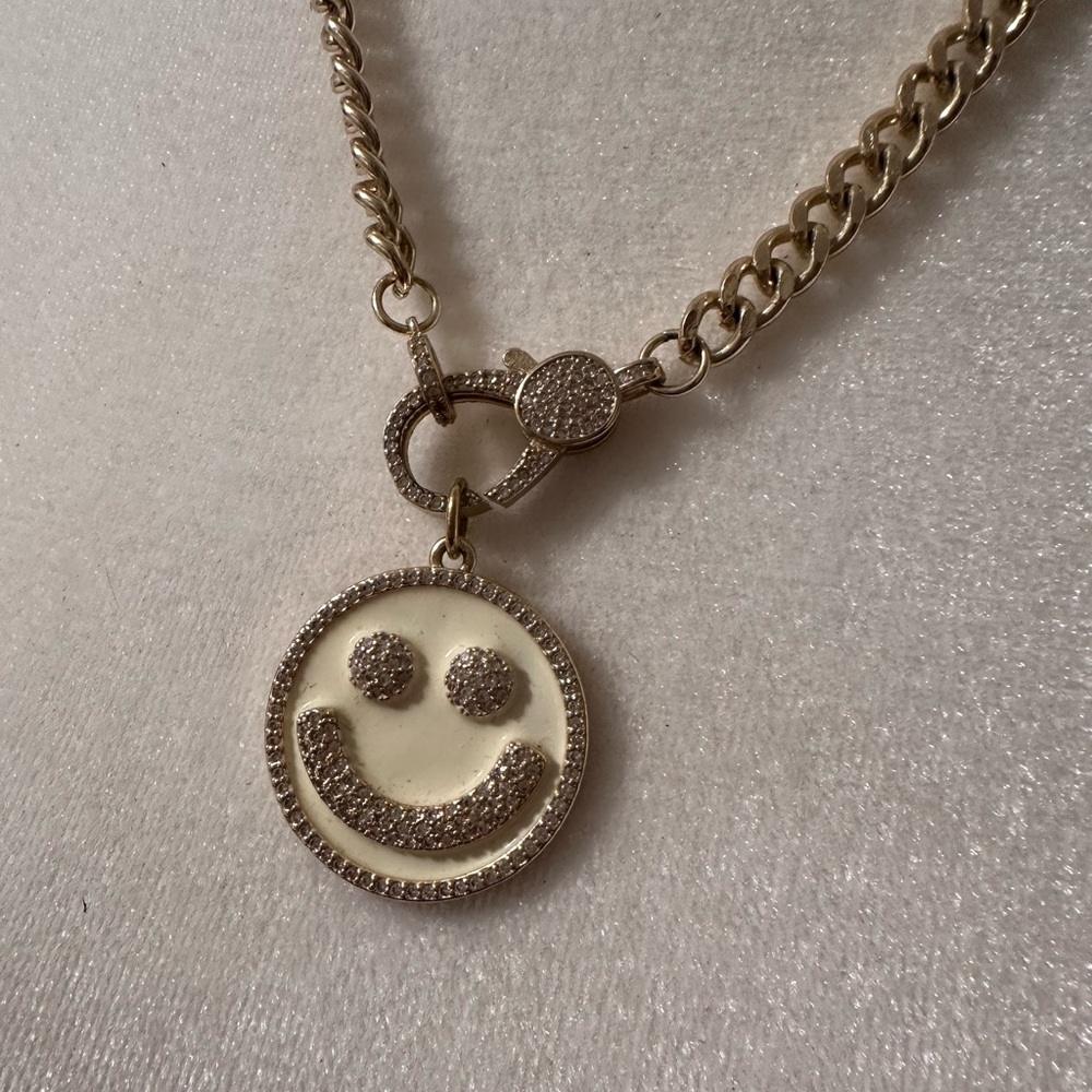 Smiley Face pendant on a gold chain with glitter clasp